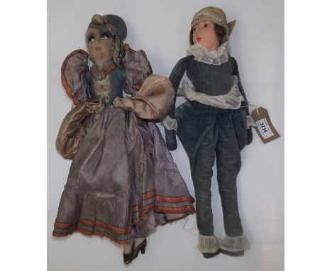 Two shorter 1920s or early 1930s boudoir dolls, one with moulded face, the other composition, fabric or ceramic body, length 