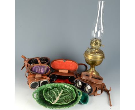 A brass oil lamp, height 29cm, four pairs of cased binoculars and three pottery dishes.