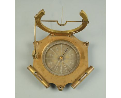 A 19th century equinoctial sun dial by Santi, Marseille with silvered 8.5cm compass, two spirit levels the back with list of 