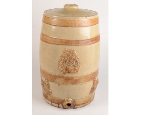 A stoneware water barrel, decorated with the Royal Coat of Arms and lions, height 46cm, diameter 26cm.