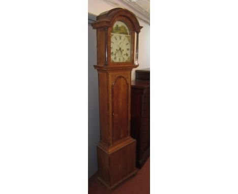 An oak and mahogany crossbanded eight day longcase clock, 19th century, the painted arched dial decorated with a cottage and 