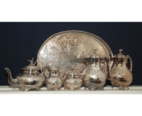 A silver plated five piece tea and coffee service with eagle finials together with an oval gallery tray.