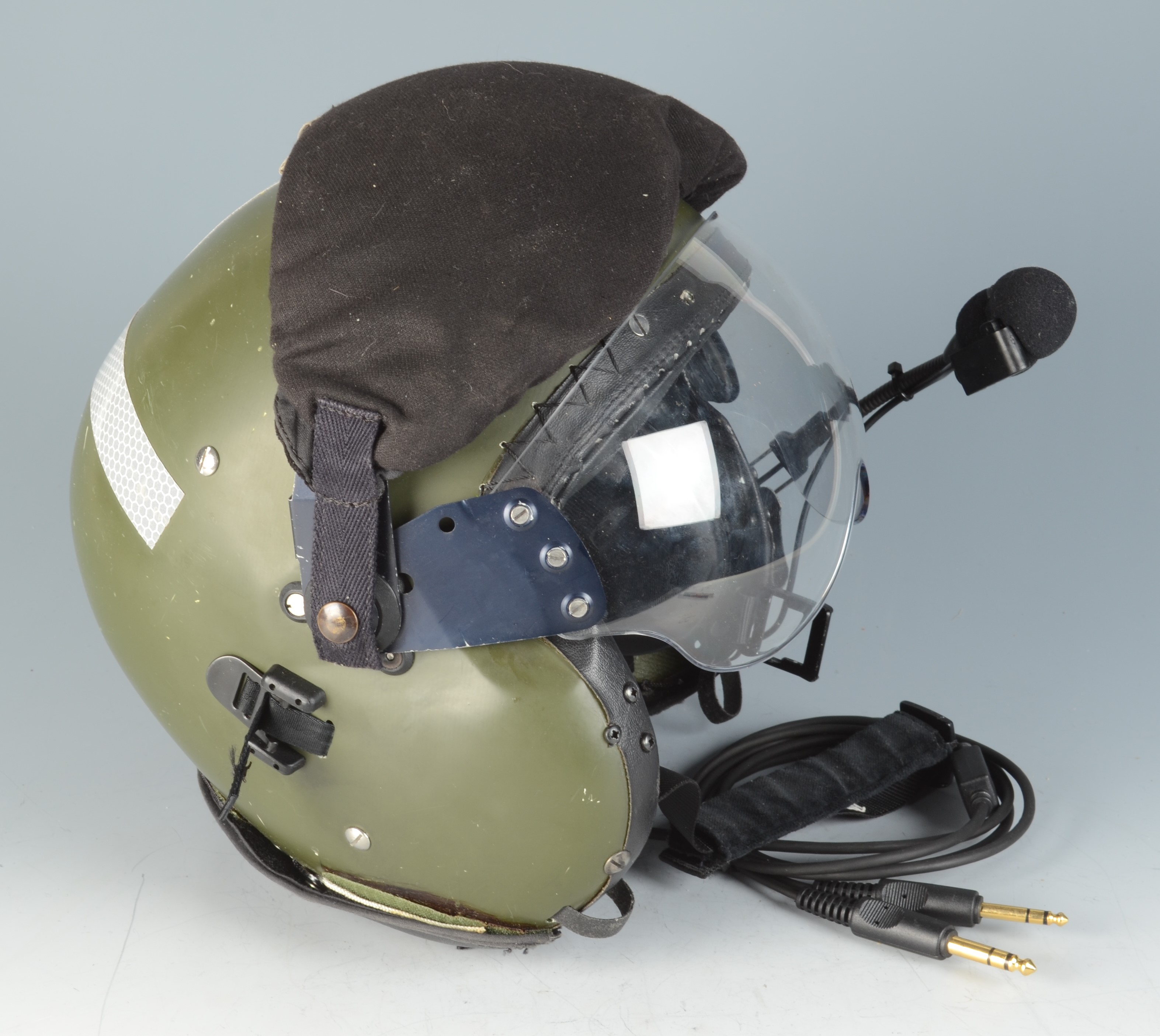 A pilot's flying helmet with leather inner and built in headphones