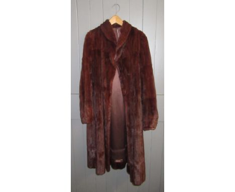 A three quarter length fur coat.