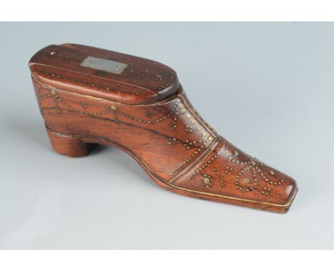 A George III treen shoe snuff box, with brass pin work decoration, the sliding cover with mother of pearl inlaid rectangular 