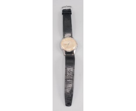 An Omega gentleman's stainless steel cased wristwatch with gold hands, blued sweep second hand, gold arab numerals and black 