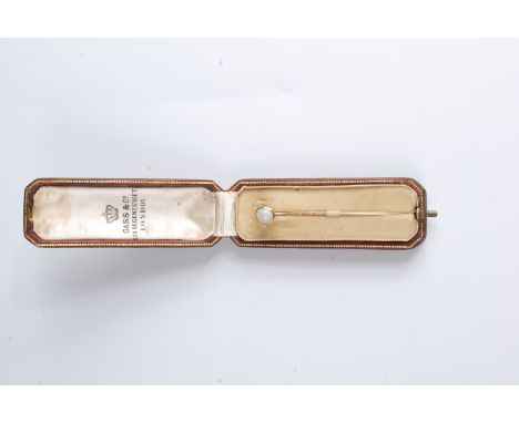 A gold stickpin the finial set in opal in a case of Gass & Co 138 Regents Street, London.
