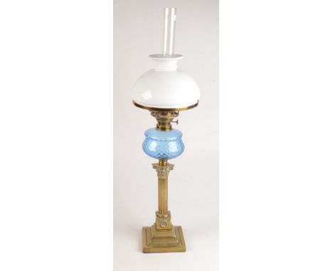 A Victorian 'Solil' brass oil lamp, the blue glass font above a Corinthian column, total height 75.5cm.