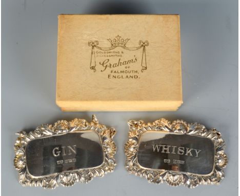 A pair of post war silver decanter labels for gin and whisky. 