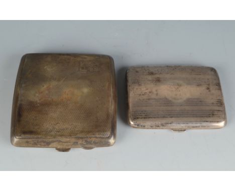 Two engine turned silver cigarette cases, 5.4oz.