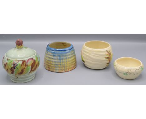 A Clarice Cliff Delecia honey pot, height 6.3cm, diameter 9.5cm and a Clarice Cliff Bizarre 'Secrets' pattern pot, diameter 6