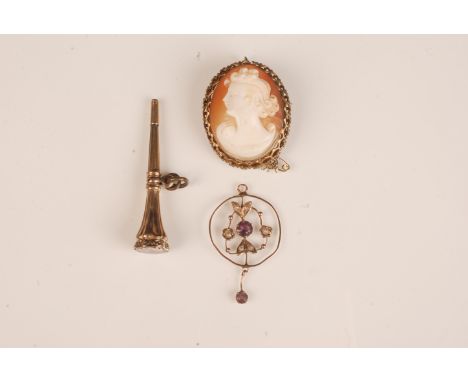 A Victorian watch key seal , a cameo brooch and a gold pendant. 