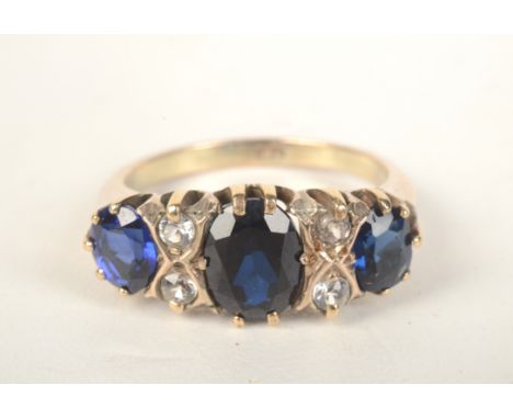 A 9ct gold blue and white stone ring in Victorian style. 