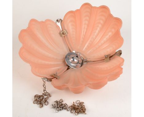 An Art Deco pink glass hanging ceiling shade, Reg. No. 863.667, in the form of shells, diameter 36.5cm.    