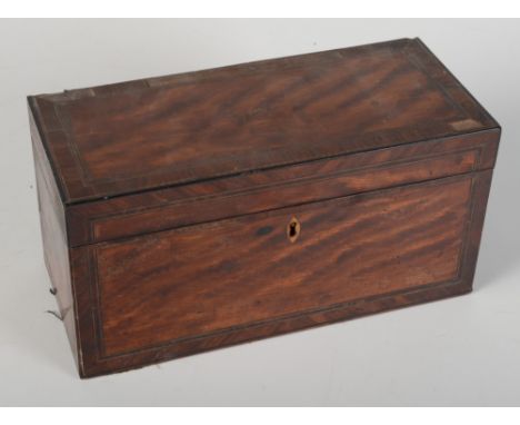 A George III mahogany tea caddy, the cover opening to reveal a burr wood oval and satinwood crossbanding, width 28.3cm, lacks