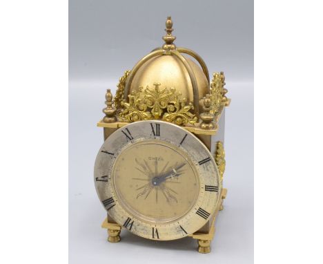 A 'Swiza 8' brass miniature lantern clock, height 13cm.