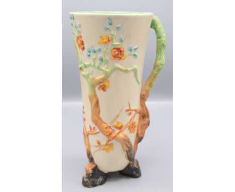 A Clarice Cliff Indian Tree jug, height 26cm.