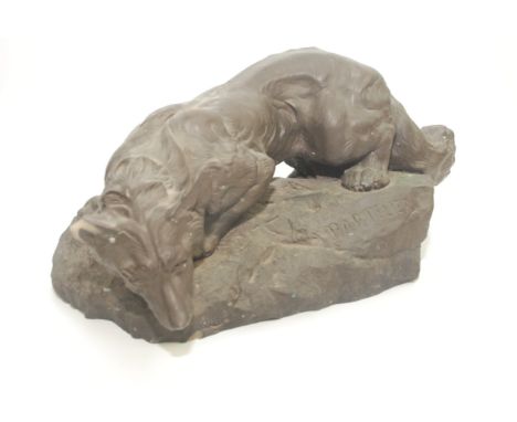 A bronzed resin model of a prowling fox, after Bartelier, height 17.5cm, width 40cm. 