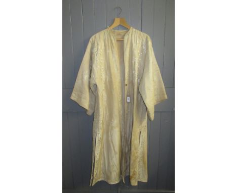A Japanese cream silk embroidered coat, labelled S.IIDA Takashimaya.   Condition report:  Staining and discolouration through