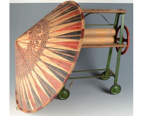 A child's toy Tri-ang green metal and wood mangle, height 48cm and a Chinese wicker and bamboo conical hat, diameter 62cm, an