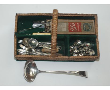 Miscellaneous silver plated flatware, including a soup ladle, in a wicker cutlery tray, length 31cm. 