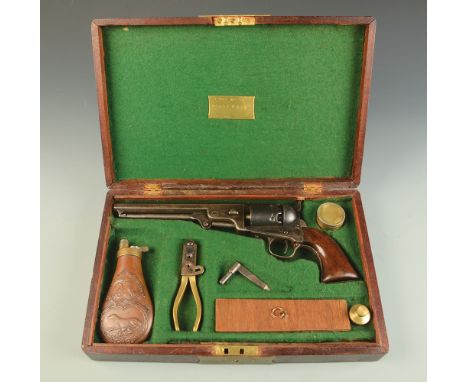 An 1851 model Navy Colt 36 calibre revolver, the barrel with New York address the cylinder with London proof marks and undeco