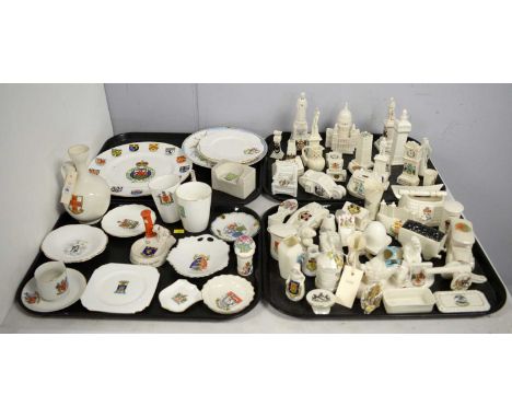 A collection of crested ceramics, comprising architectural models, figures, vases, vehicles and other items, by various maker