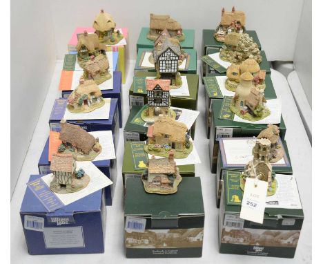 A collection of Lilliput Lane collectible cottages and other architectural sculptures, including: God’s Providence House; Smu