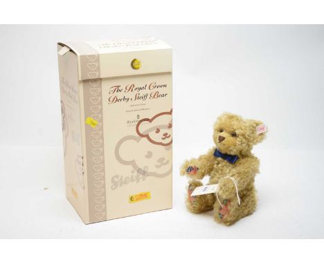 A Steiff limited edition Royal Crown Derby teddy bear, button and label to ear, 24cms high, in box.