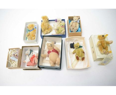 A selection of collectors' teddy bears, including: Steiff mini teddy Petsy goldblond, 6cms, in box; R. John Wright Winnie the