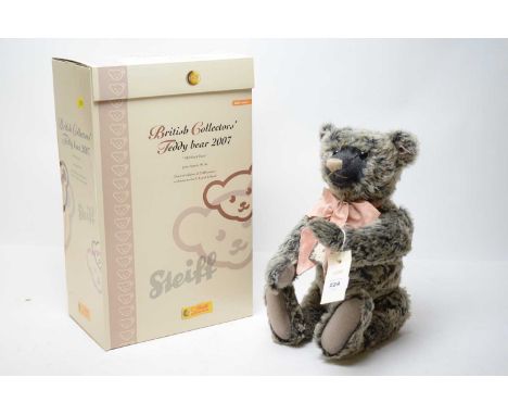 A Steiff limited edition British Collectors' teddy bear 2007, with pale pink ribbon, button and label to ear, in box.