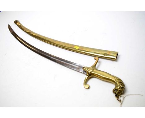 A reproduction brass sword, with 'S' quillon, brass grip terminating in lions head pommel, in brass scabbard, 87cms high over