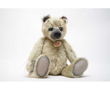 A Steiff Sam limited edition teddy bear, with label and button to ear.