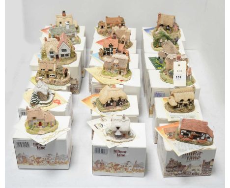 A collection of Lilliput Lane collectible architectural sculptures, including: April Cottage; The Farriers; Afternoon Tea; Ol