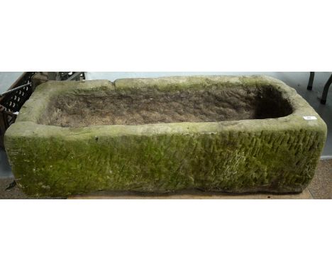 A stone composite trough garden planter, 90 x 38 x 24cms.