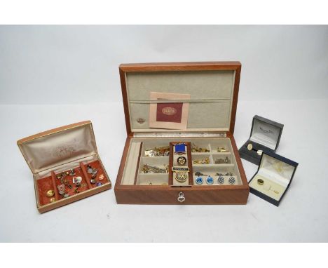 A collection of cufflinks by Paul Smith and others; and three Rotary Club medals.