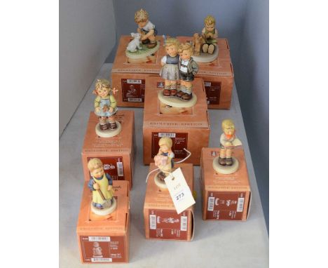 A collection of Goebel Hummel Club Exclusive Edition figures of children, including: The Little Pair; Private Conversation; P