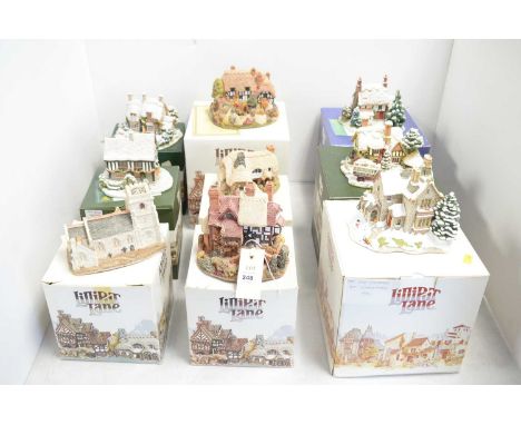 A collection of Lilliput Lane collectible architectural sculptures, including: The Old Vicarage at Christmas; Three Feathers;