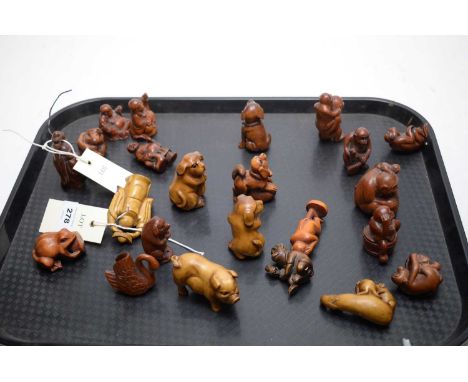 A collection of Japanese carved wooden netsuke, including: swan; monkeys; buddha figures; and others; together with a selecti