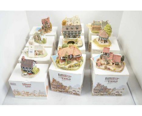 A collection of Lilliput Lane collectible architectural sculptures, including: Wealden House; Flower Sellers; High Bridge, Li