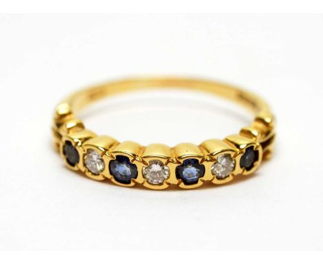 A sapphire and diamond half hoop eternity ring, with floral shoulders, on 18ct yellow gold shank, ring size R, 3.8g gross. 