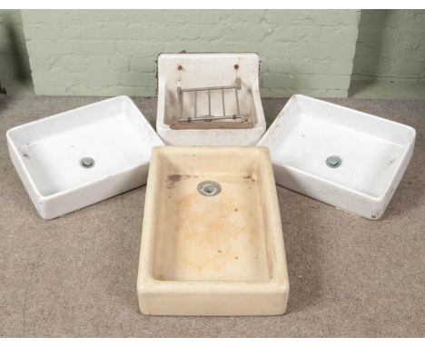 A collection of four ceramic Belfast sinks including Astracast example.  