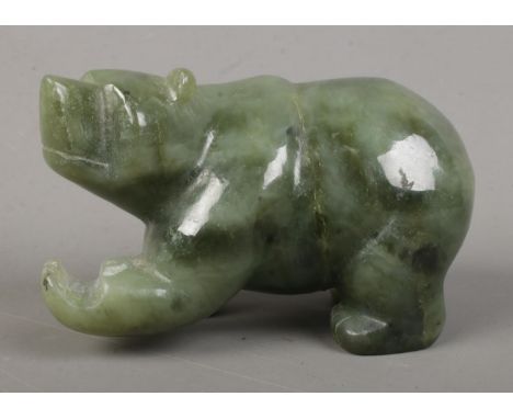A carved nephrite jade bear.Length 10.5cm  