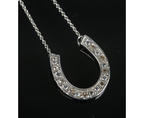 A 9ct white gold and diamond set horseshoe necklace on chain. Total weight 2.8g.  