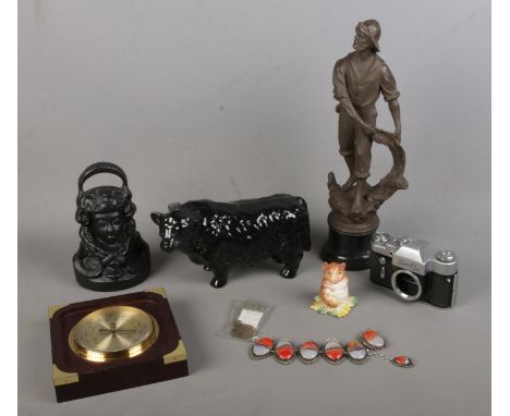 A quantity of collectables to include Zenit 3m, Beswick Beatrix Potter figure, bull decanter, cast iron doorstop, etc.  