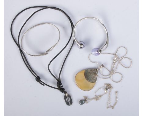 A collection of silver jewellery to include mother of pearl pendant , men's Tateossian trident leather cord, bangles, etc.  A