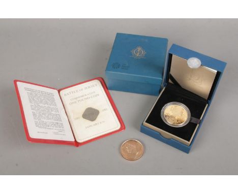 A collection of commemorative coins to include boxed Royal Mint Queen Elizabeth Diamond Jubilee, Bronze Waterloo Campaign Med