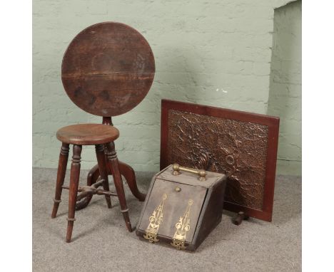 An oak tilt top wine table with turned oak stool wood and copper fire screen and Victorian oak and brass coal scuttle.  