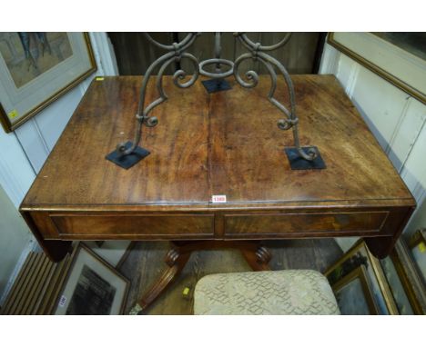 A George IV mahogany sofa table, 91cm wide. 