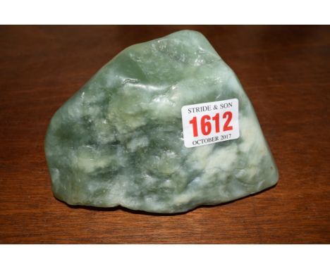 A green jade boulder, 14cm wide. 